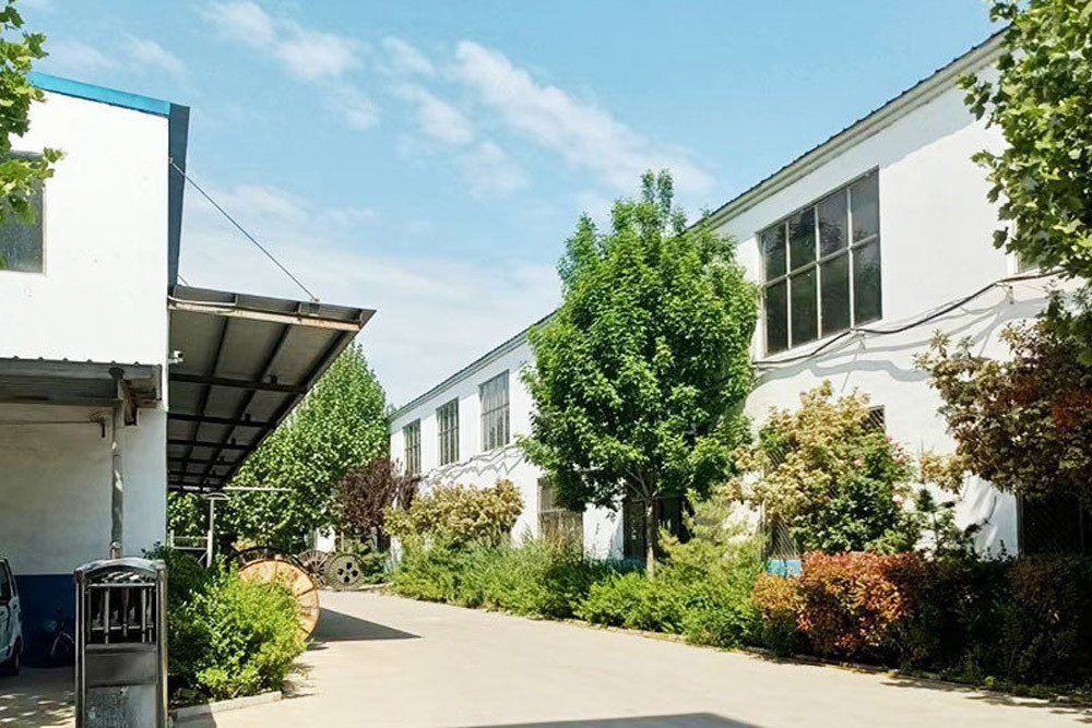 Factory entrance with landscaping at Shandong Lulian Cable