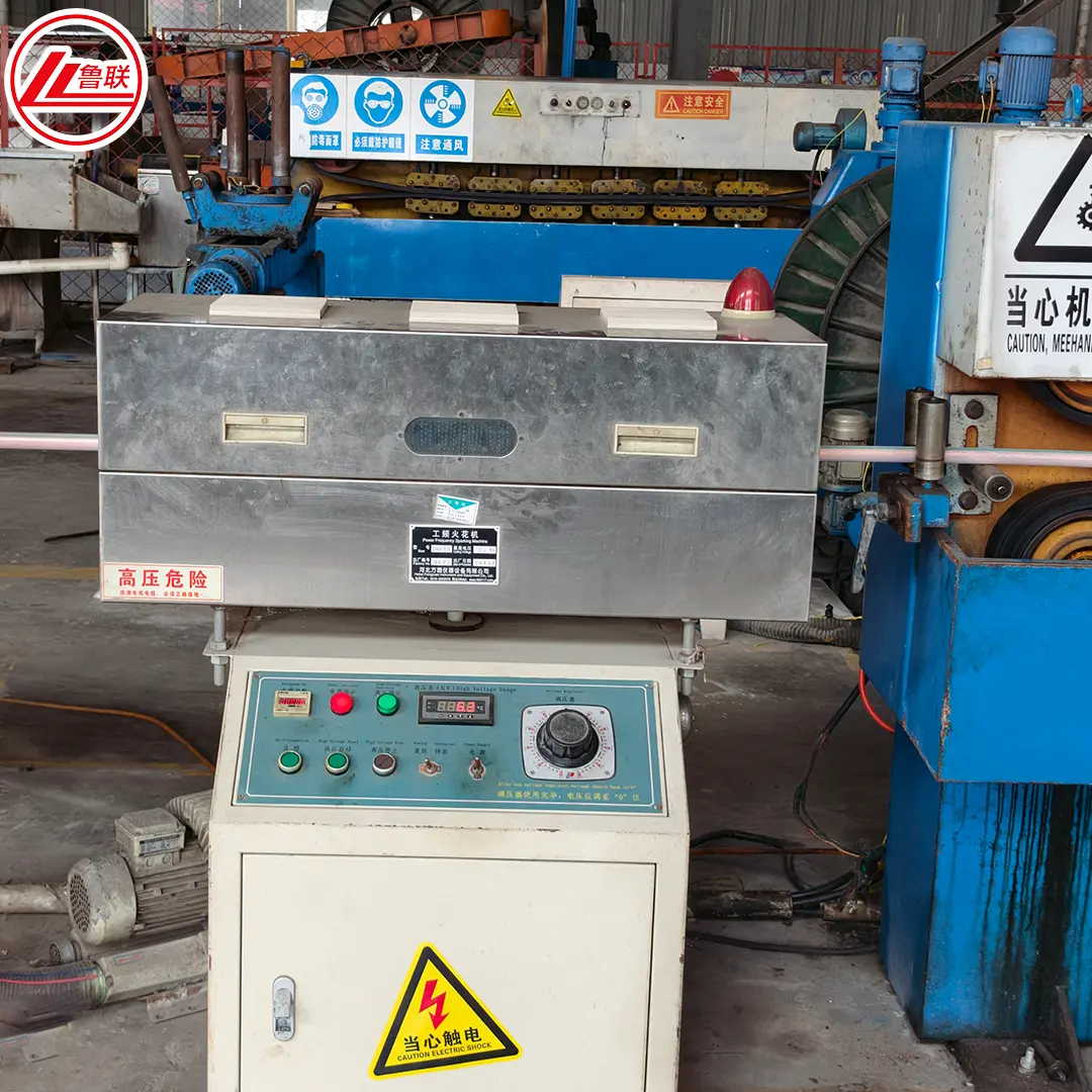 In-process spark testing during cable production